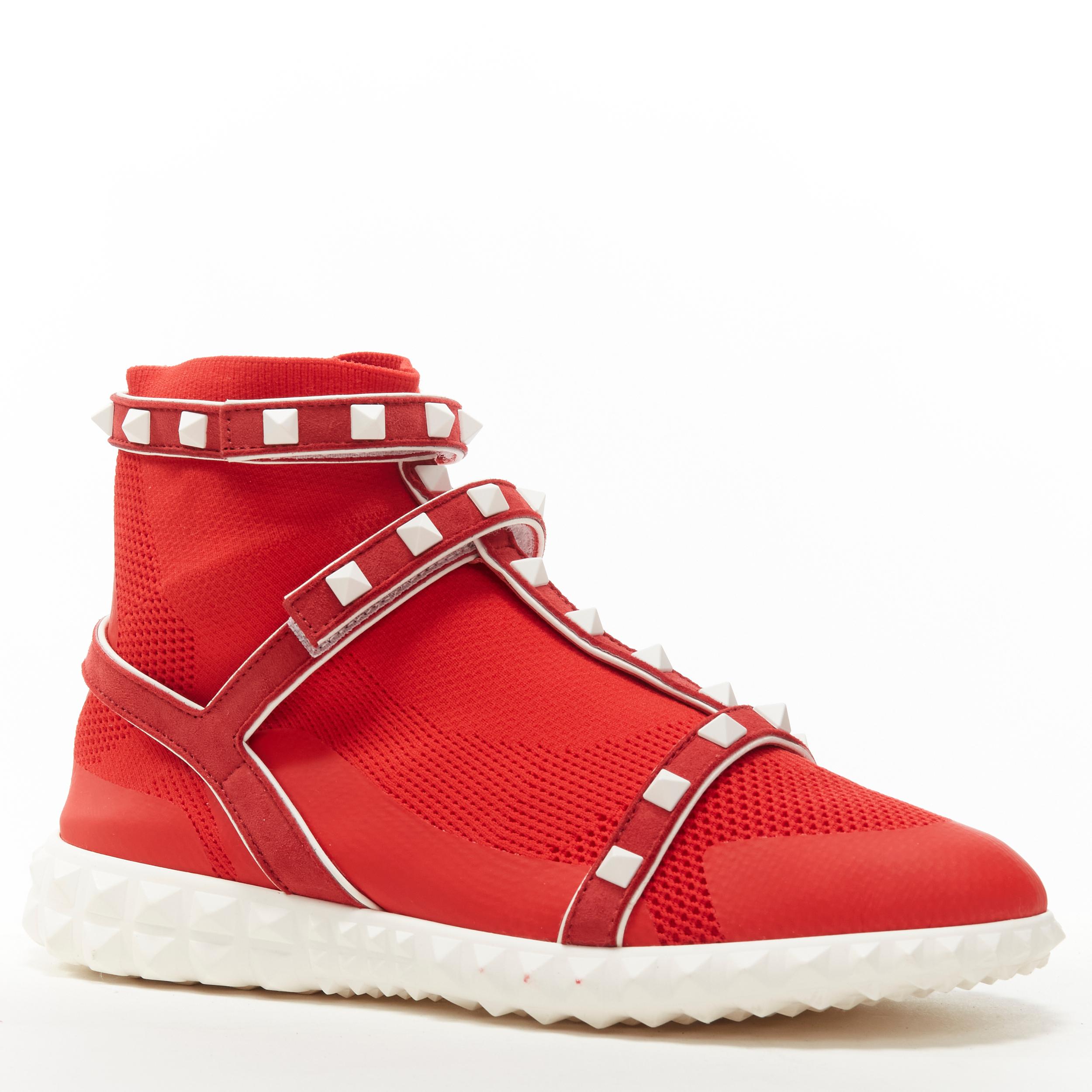VALENTINO Free Rockstud Bodytech red sock knit white stud high top sneaker EU36 
Reference: ANWU/A00176 
Brand: Valentino 
Model: Free Rockstud 
Material: Fabric 
Color: Red 
Pattern: Solid 
Closure: Magic Tape 
Extra Detail: Sock fabric knit upper.