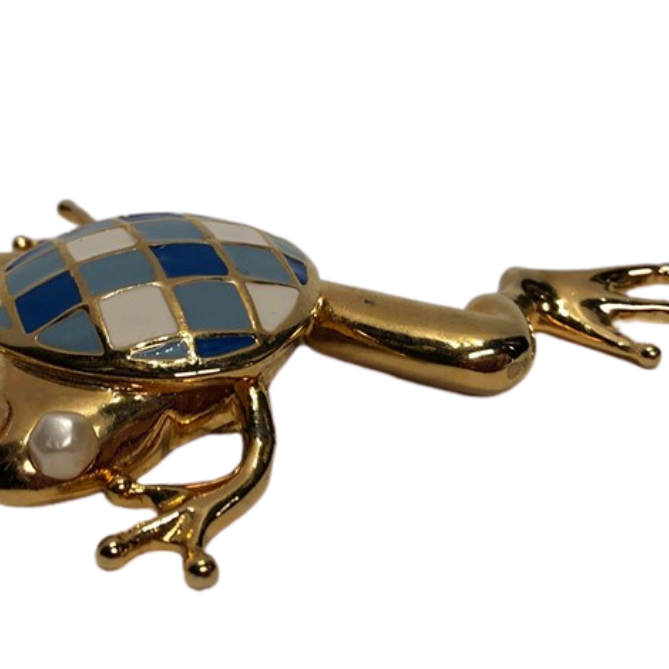 Rare vintage gold toned Valentino frog brooch with blue and white enamel detailing and faux pearl eye balls.

