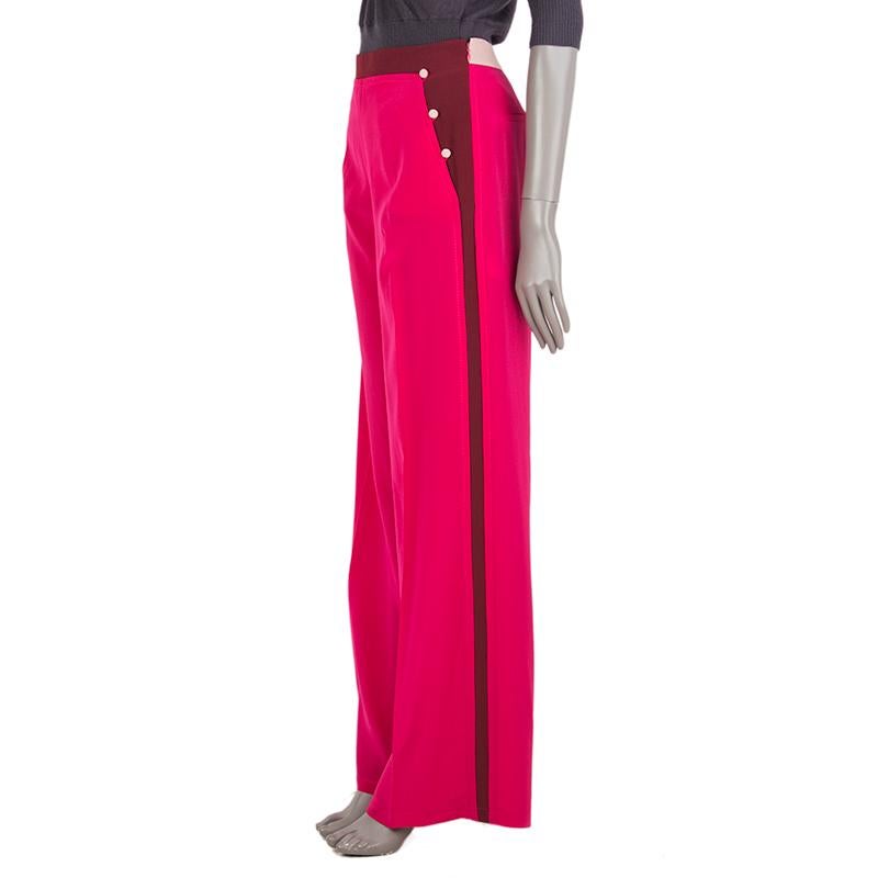 Valentino wide pants in fuchsia, burgundy and nude silk (100%). Two side button and two back slit pockets. Open with zipper on the side. Unlined. Have been worn and are in excellent condition. 

Tag Size 40
Size S
Waist 72cm (28.1in)
Hips 90cm