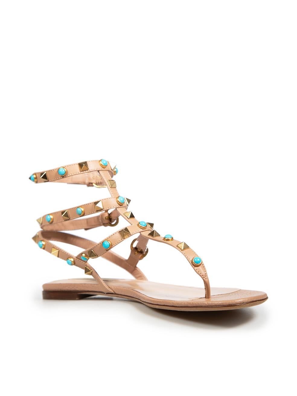 CONDITION is Very good. Minimal wear to the sandals is evident. General creasing to the leather across the straps to both shoes. Minor tarnishing to all of the buckles on both shoes on this used Valentino Garavani designer resale item. These shoes