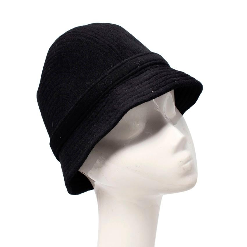 Valentino Garavani Black Cashmere Cloche Hat
 

 - Cloche style hat crafted from cashmere cloth
 - Decorative tonal seaming detail throughout 
 - Grosgrain interior band
 

 Materials 
 100% Cashmere 
 

 Made in Italy
 

 PLEASE NOTE, THESE ITEMS