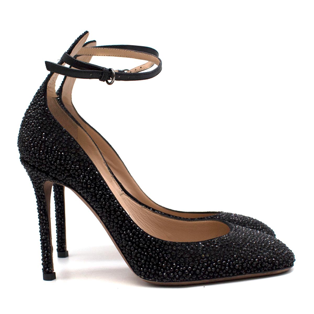 Valentino Garavani Black Crystal Embellished Pumps 

- Black pumps
- Stiletto heel
- Round toe
- Black leather ankle buckle strap 
- Black crystal embellishment
- Nude leather insole & sole.

This item comes with the box. 

Please note, these items