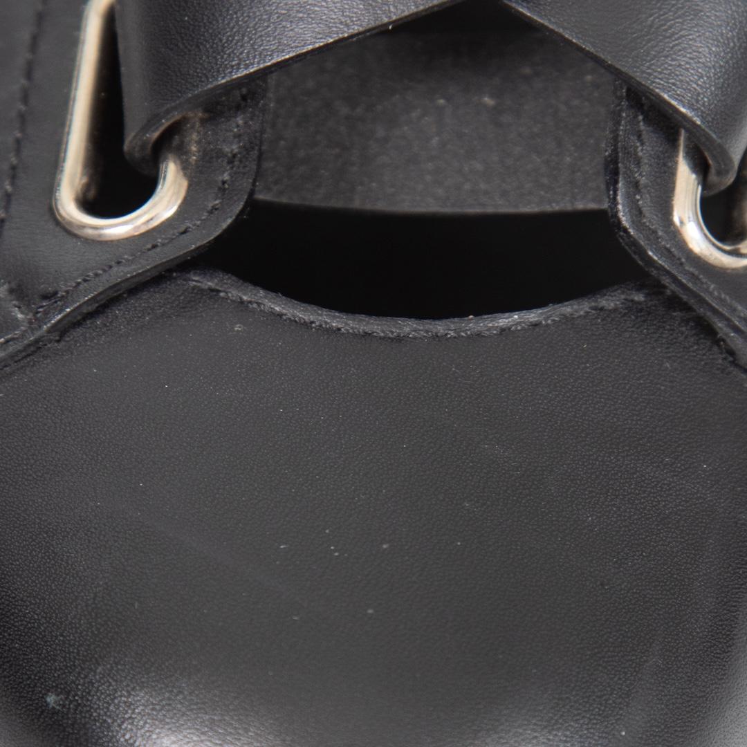 Valentino Garavani Bottes à boucles en cuir noir Taille IT 38 Pour femmes en vente