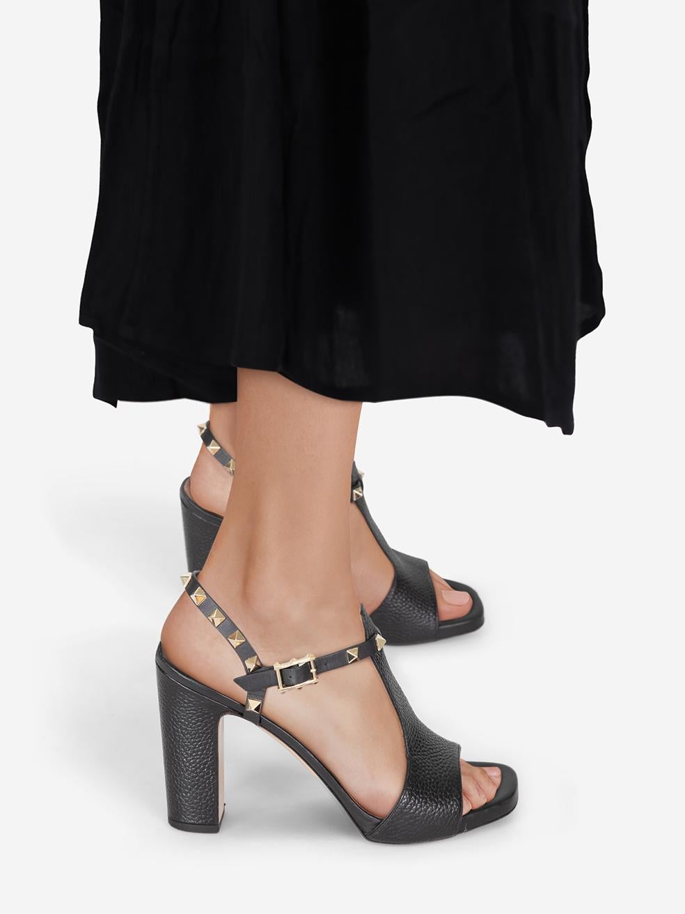 CONDITION is Very good. Minimal wear to sandal is evident. Minimal wear to the top of the heel on both shoes where some small abrasions can be seen. The insoles on both shoes show some discolouration on this used Valentino Garavani designer resale