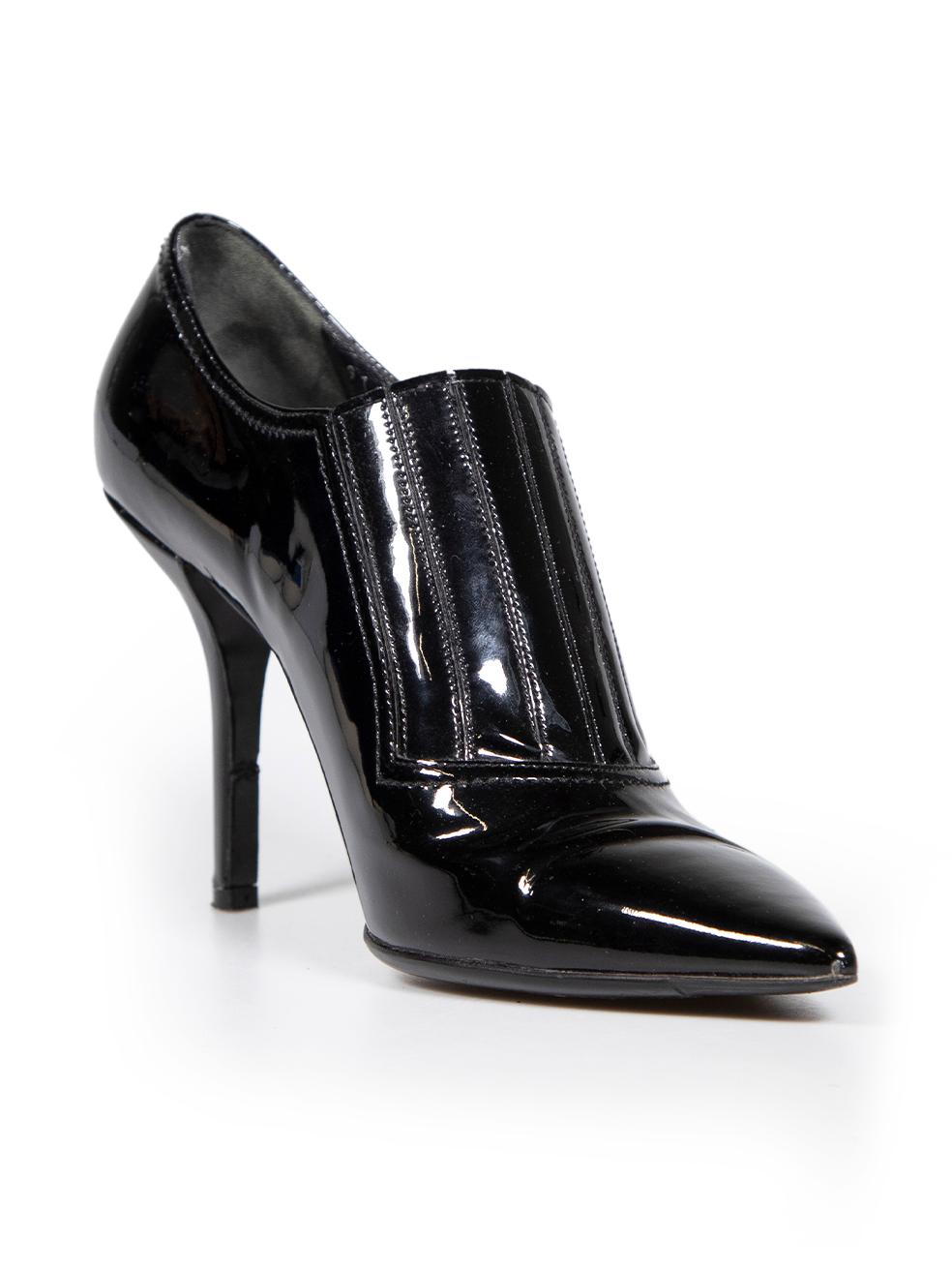 CONDITION is Very good. Minimal wear to shoes is evident. Minimal wear to both shoe toes and left sides with abrasions to the leather on this used Valentino designer resale item.
 
 Details
 Black
 Patent leather
 Heels
 Point toe
 High heeled

