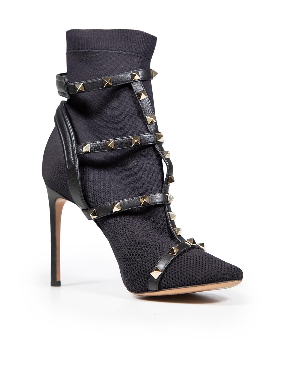 CONDITION is Very good. Minimal wear to boots is evident. Minimal indent and abrasion to the heel of right shoe on this used Valentino Garavani designer resale item.
 
 
 
 Details
 
 
 Black
 
 Cloth textile
 
 Ankle sock boots
 
 Round toe
 
 Gold