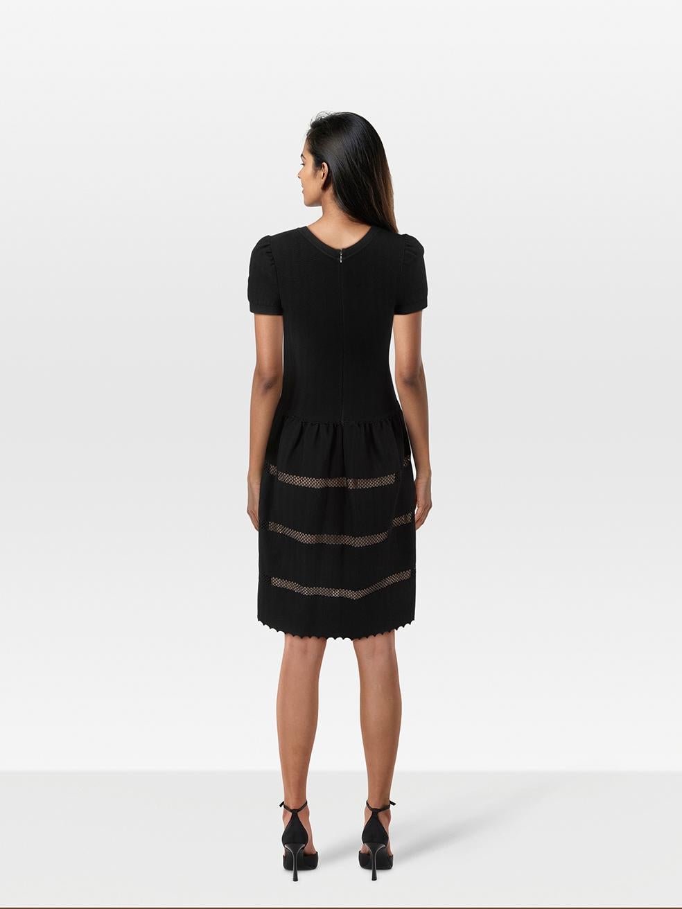 CONDITION is Very good. Minimal wear to the dress is evident. Scratching to the centre back zipper pull on this used Valentino Garavani designer resale item.
 
 
 
 Details
 
 
 Black
 
 Viscose
 
 Dress
 
 Knee length
 
 Short sleeves
 
 Round