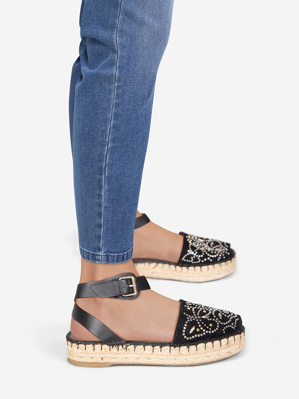 CONDITION is Very good. Minimal wear to the espadrilles is evident. Abrasion on the ankle strap on both shoes on this used Valentino Garavani designer resale item. This pair of shoes comes in the original box.
 
 
 
 Details
 
 
 Black
 
 Suede
 
