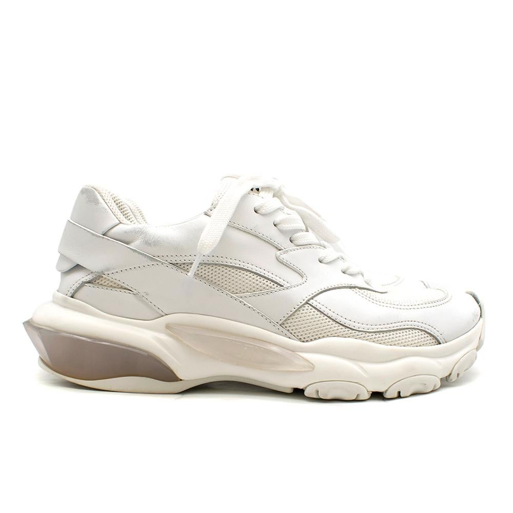 Valentino Garavani Bounce White Leather Sneaker 

- Low-Tops
- Made in Italy
- Smooth white leather and mesh
- a thick rubber sole with architectural detailing
- Upper: fabric
- Trim: calf leather
- Sole: fabric insole, rubber sole
- Almond toe
-