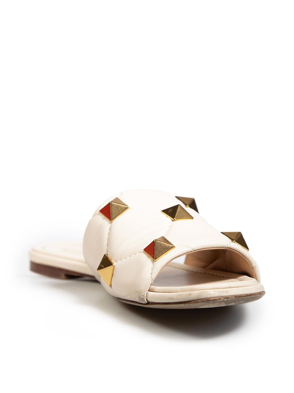 CONDITION is Good. General wear to sandals is evident. Moderate signs of wear to insoles with discolouration marks , abrasions to the back counters, front edges, sides and the corners of the upper on both shoes on this used Valentino Garavani