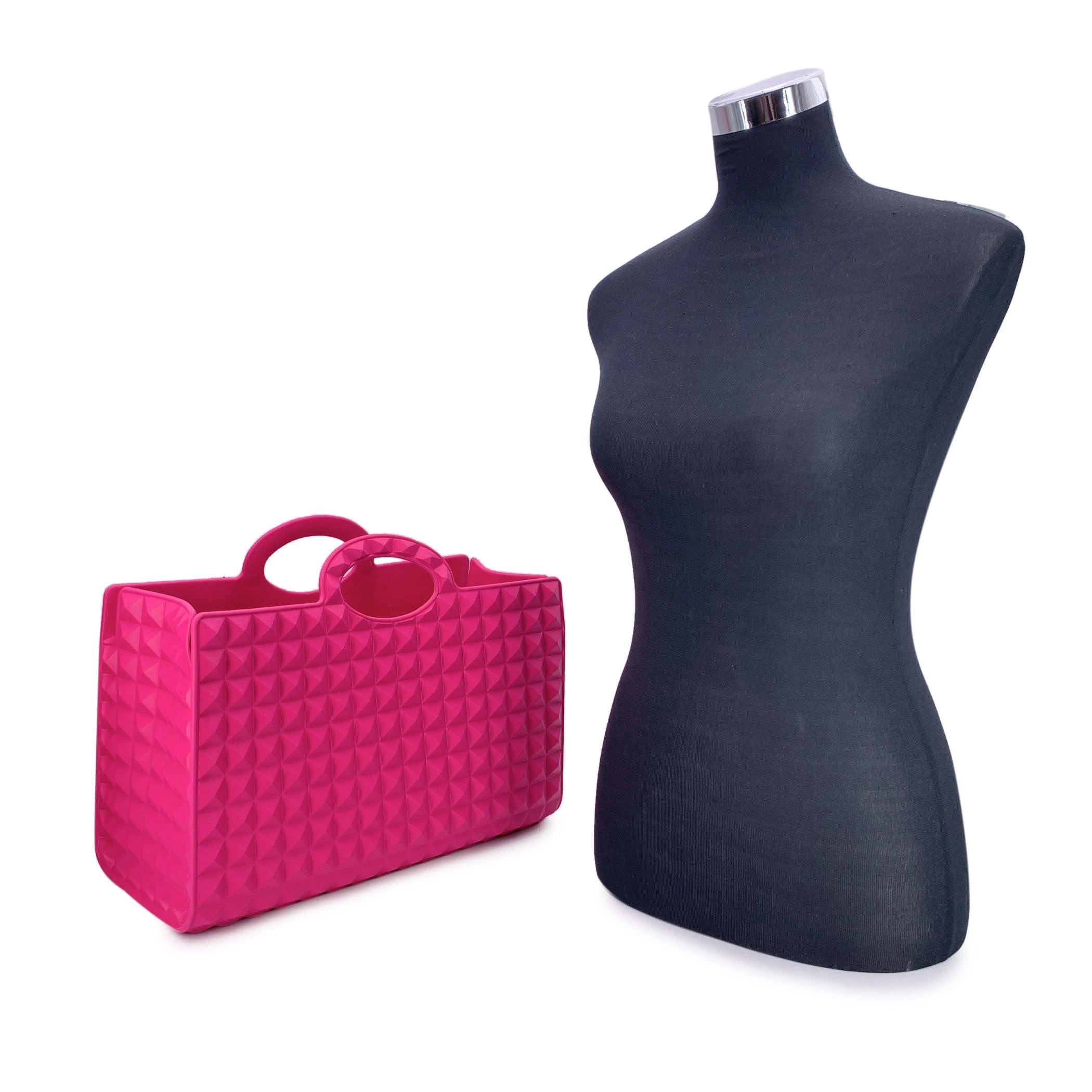 This beautiful item will come with a Certificate of Authenticity provided by Entrupy. The certificate will be provided at no further cost For lovers of bold design and high-fashion nostalgia, the VALENTINO GARAVANI Rubber Le Troisieme Tote in