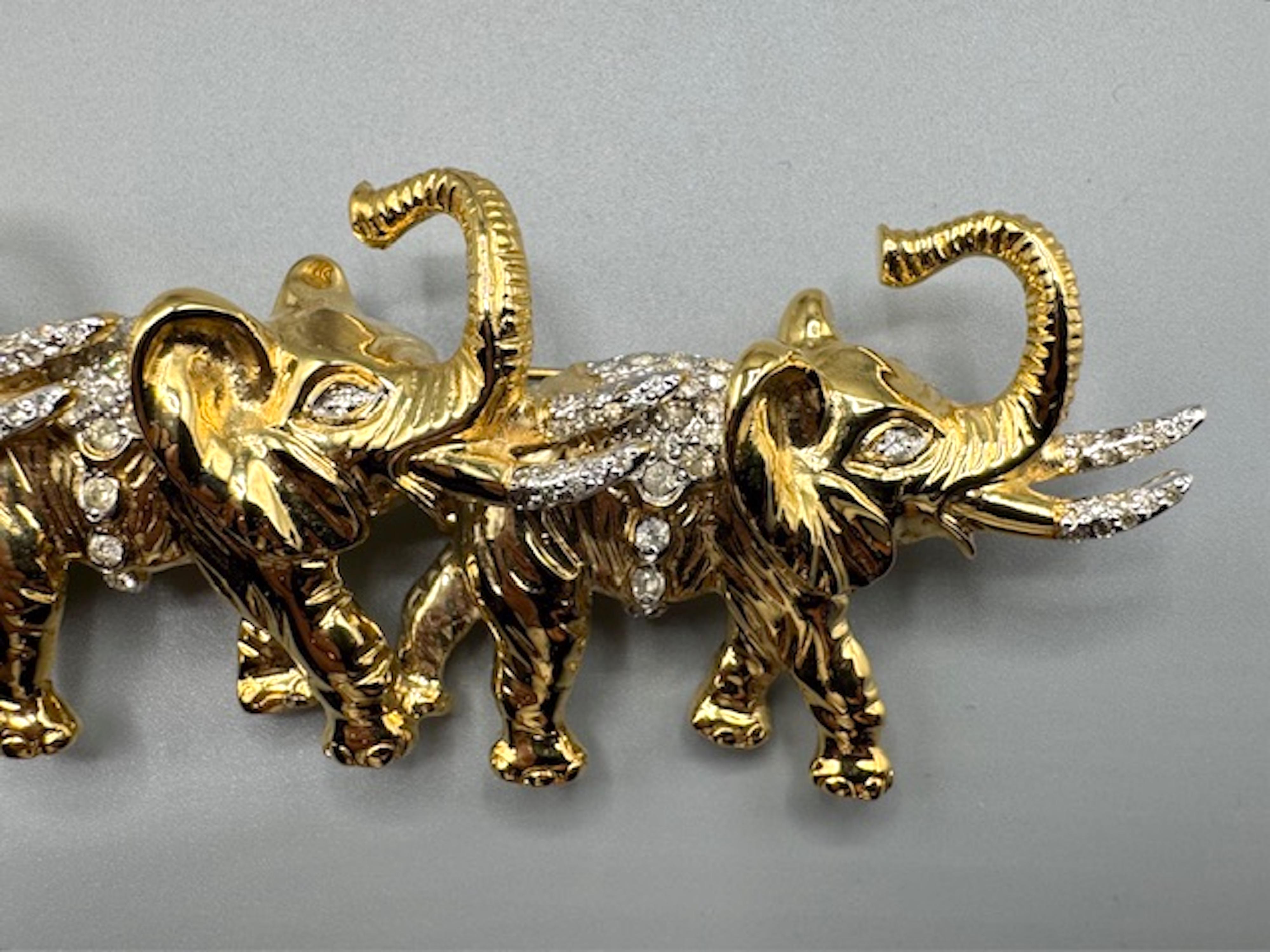 Women's or Men's Valentino Garavani Gold & Rhinestone Parade of Elephants Brooch For Sale
