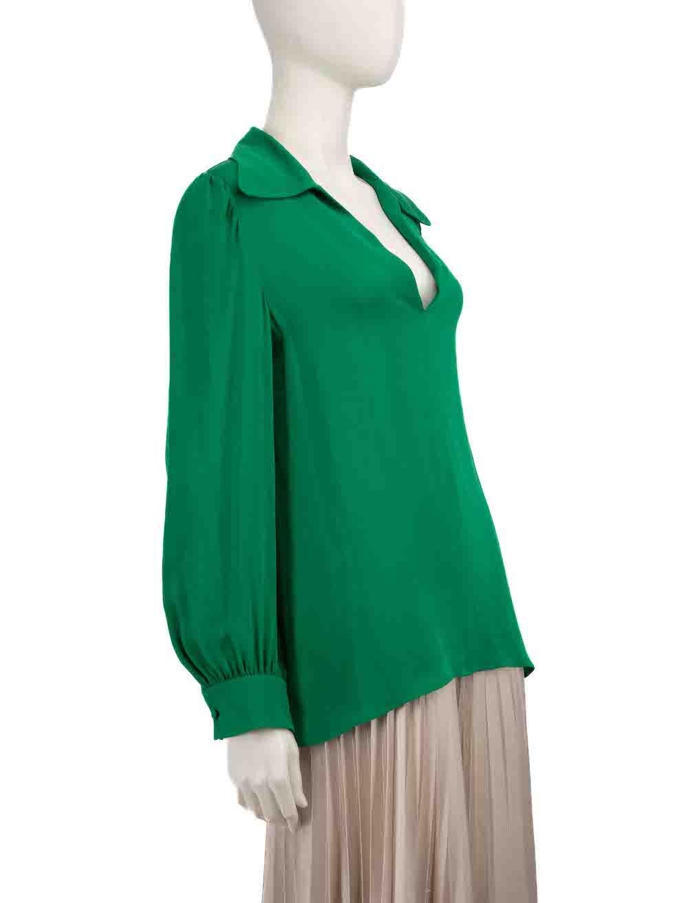CONDITION is Very good. Minimal wear to shirt is evident. The size and care label has been removed on this used Valentino designer resale item.
 
 
 
 Details
 
 
 Green
 
 Silk
 
 Blouse
 
 Long sleeves
 
 Buttoned cuffs
 
 Neck tie detail
 
 
 
 
