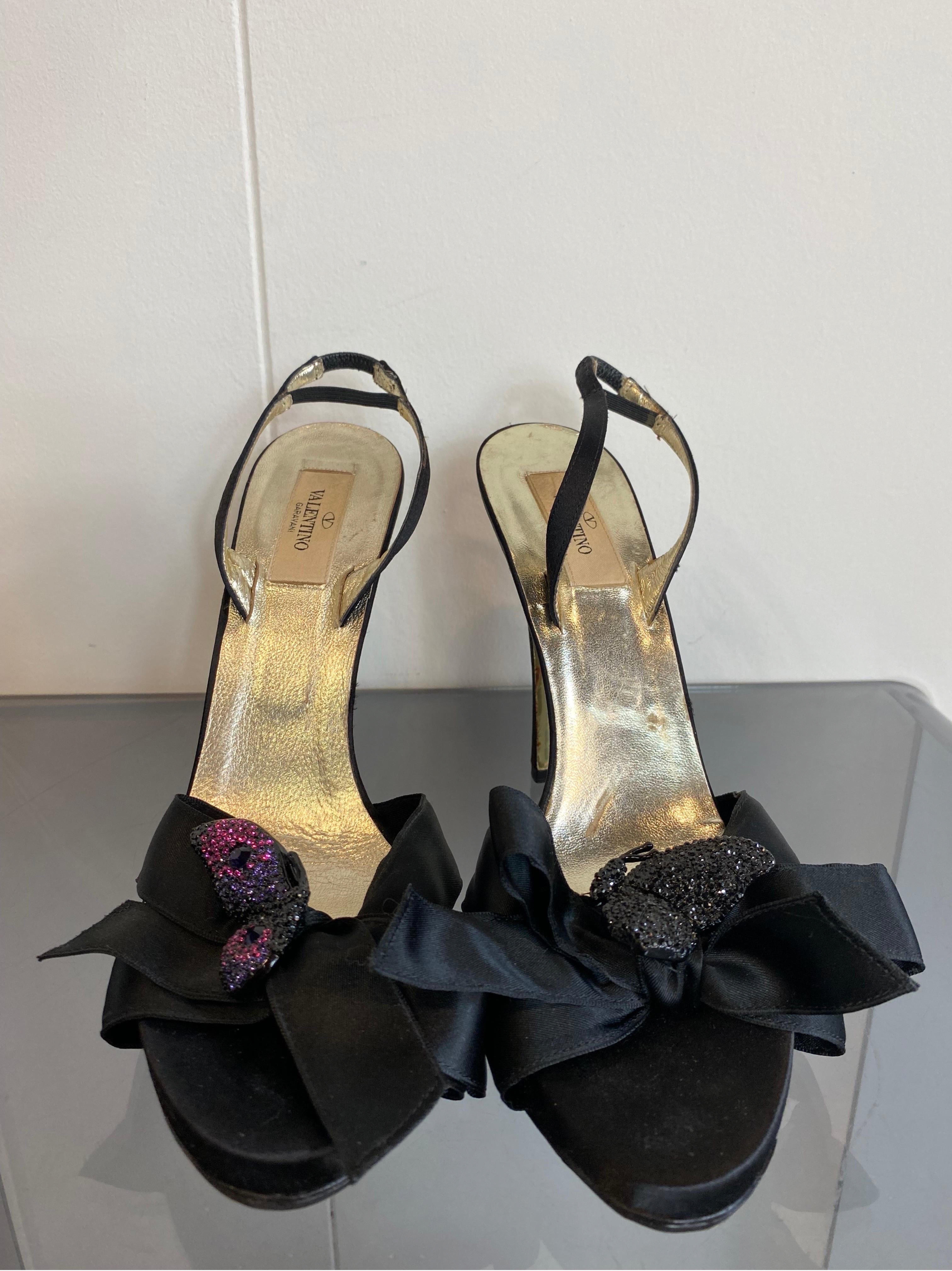 Sandalia de tacón Valentino Garavani
Mariposa de strass Negro en venta