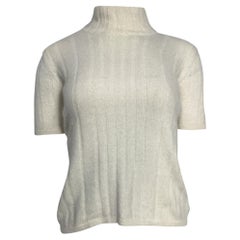Maglia a collo alto a maniche corte in maglia di Valentino Garavani, in lana color avorio