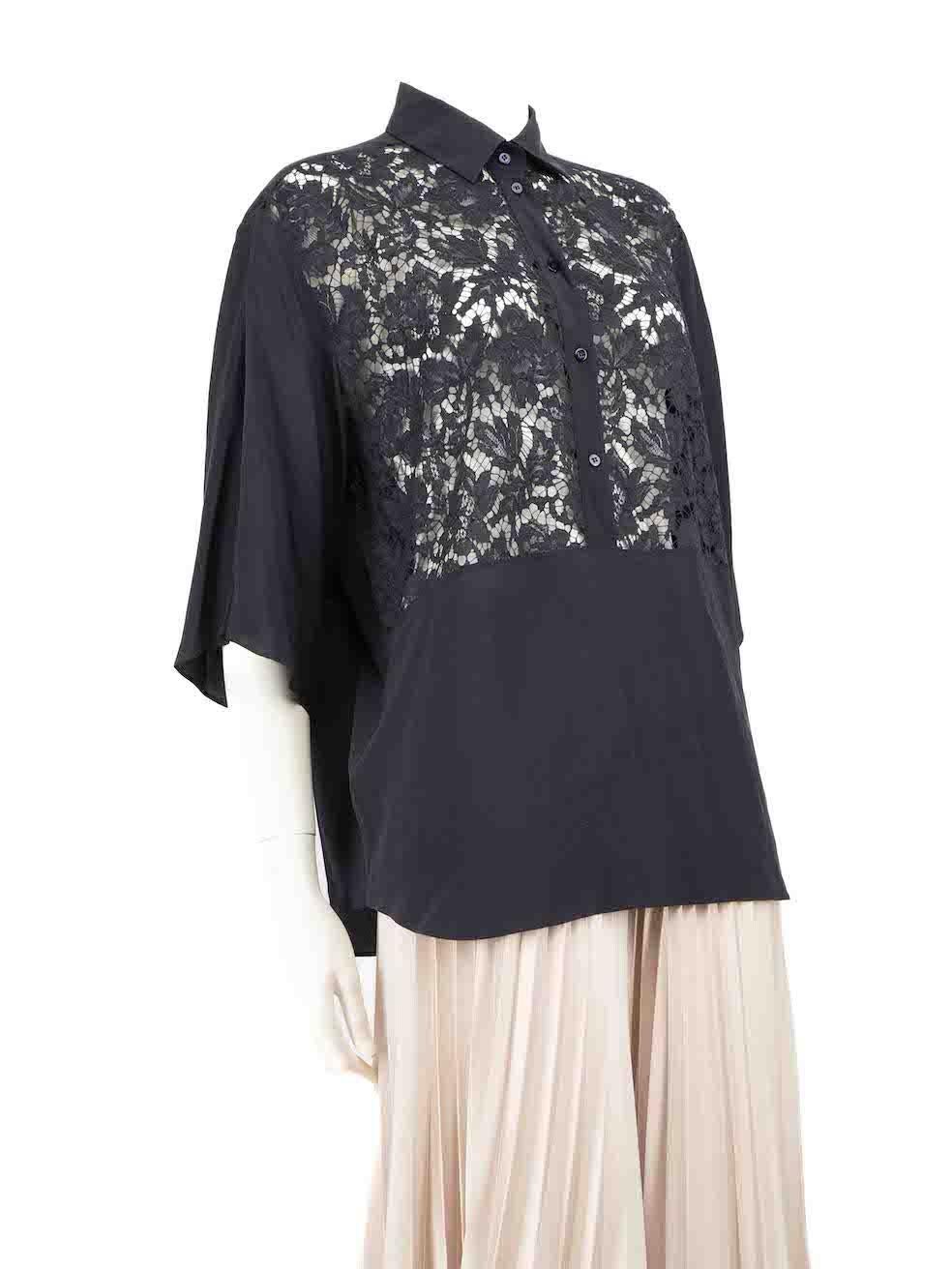 CONDITION is Very good. Hardly any visible wear to the top is evident on this used Valentino Garavani designer resale item.
 
 
 
 Details
 
 
 Navy
 
 Silk
 
 Blouse
 
 Front see through lace panel
 
 Short sleeves
 
 Button up fastening
 
 
 
 
 
