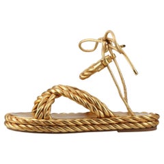 Valentino Garavani Patent Leather Twist Criss Cross Sandal Gold