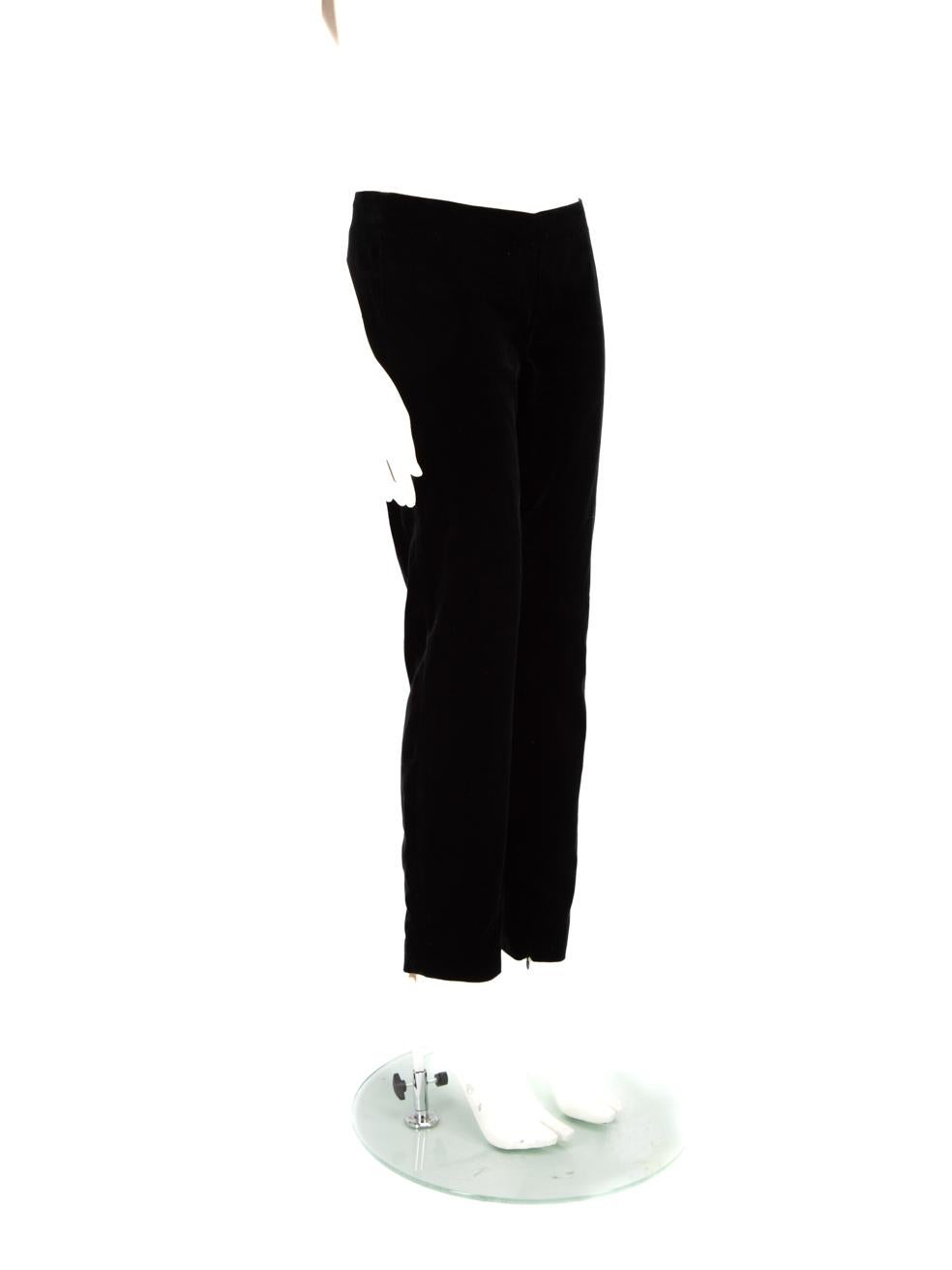 CONDITION is Very good. Minimal wear to the trousers is evident. Scratching to the velvet on the front left and back right trouser legs. Missing size and composition label on this used Red Valentino designer resale