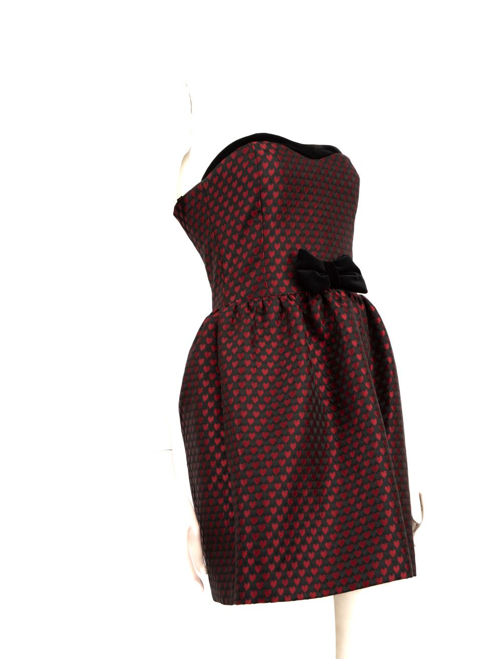 CONDITION is Never worn. No visible wear to dress is evident on this new Red Valentino designer resale item.
 
 Details
 Multicolour: Black and Red
 Polyester
 Dress
 Mini
 Strapless
 Front bow detail
 Heart pattern
 Back zip fastening
 
 
 Made in