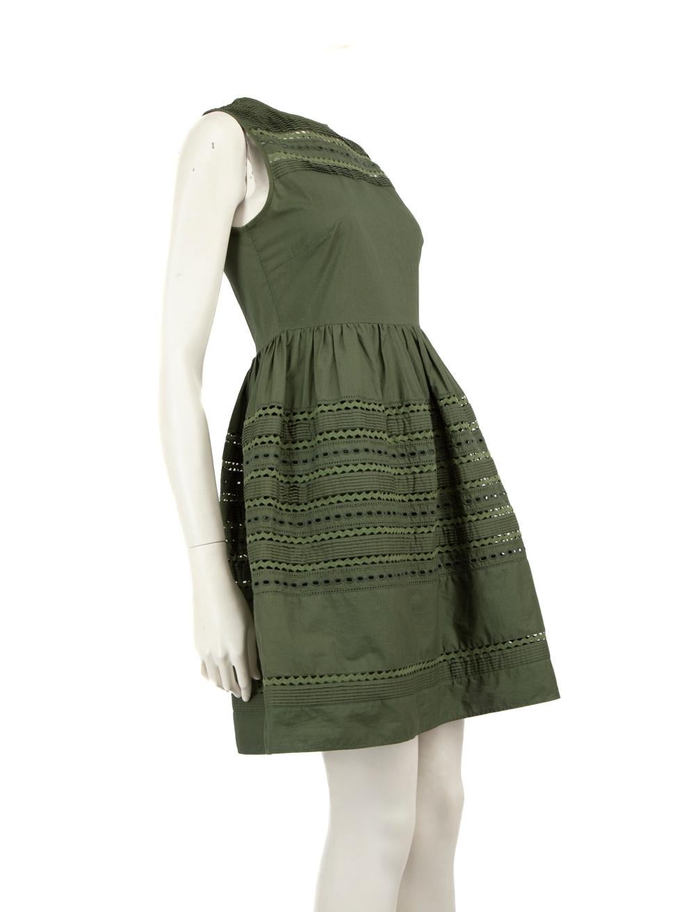 CONDITION is Very good. Minimal wear to dress is evident. Light markings along underarm areas on this used Red Valentino designer resale item. This item comes with a skirt lining.
 
 Details
 
 
 Khaki
 
 Cotton
 
 Dress
 
 Mini
 
 Sleeveless
 
