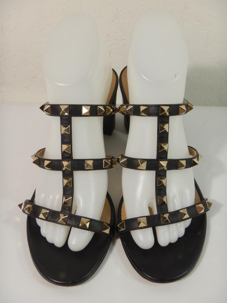 Valentino Rockstud gladiator sandals, black leather upper. Size 39 / US 9.

There are some scratches on the back of the left heel. Please see close up images for wear. 

MEASUREMENTS:

Heel Height: 2.5 inches
Insole Length: 10 inches toe to heel