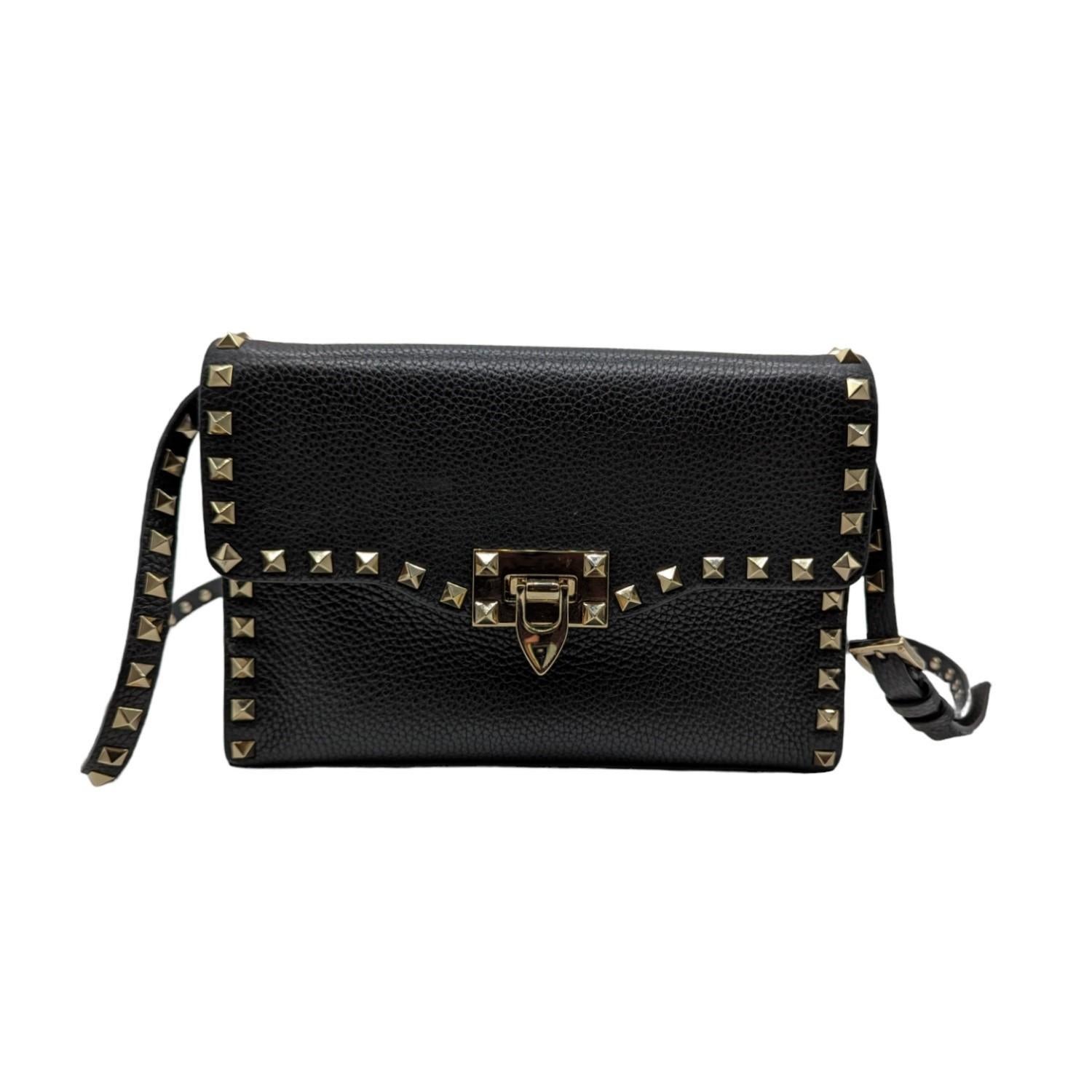 Valentino Garavani the pebbled lamb leather shoulder bag with signature Rockstud trim is lightweight and great for a night out or concert. Est. Retail $1,650.

Designer: Valentino Garavani
Material: Lambskin leather
Origin: Italy
Measurements: 9