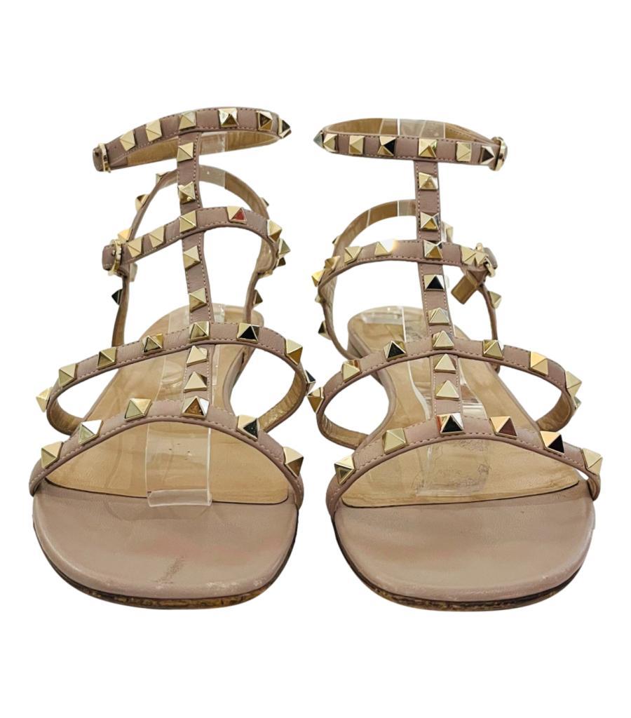 Valentino Garavani Rockstud Leather Sandals
Cool pink nude in colour, strappy flats designed with the brand's signature gold studs.
Featuring square open toe and adjustable, buckle closure. Leather lining.
Size – 42
Condition – Fair/Good (Visible