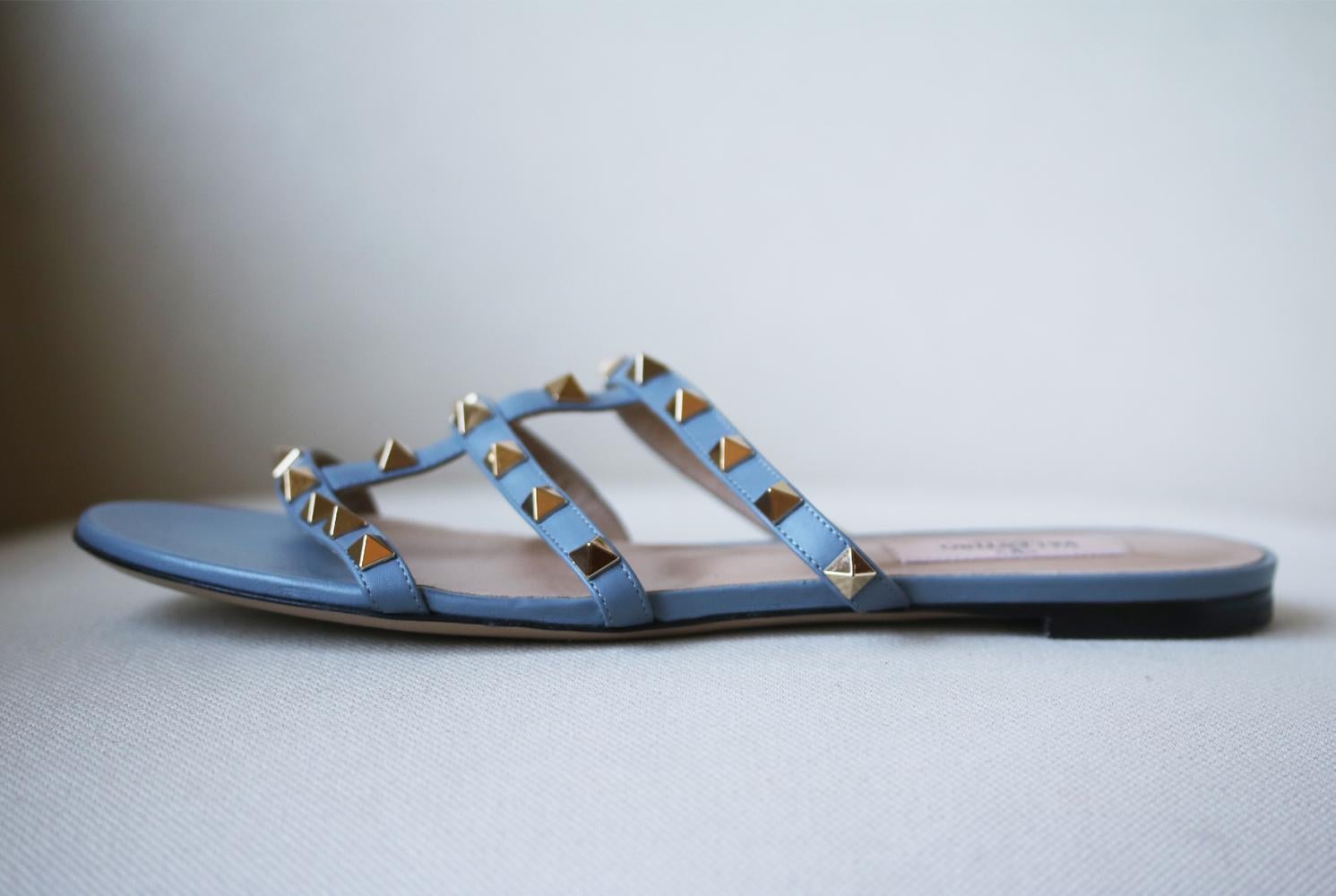 A perfect choice for day or evening, these sandals have been crafted in Italy from light-blue leather and feature thin, caged straps that beautifully frame the feet. Heel measures approximately 10mm/ 0.5 inches. Light-blue leather (Calf). Slip on.
