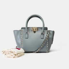 Valentino Garavani “Rockstud” Mini Tote bag in light blue leather