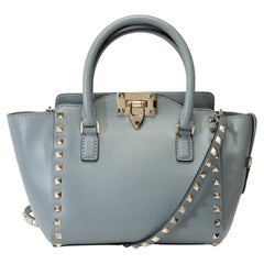 Valentino Garavani “Rockstud” Mini Tote bag in light blue leather