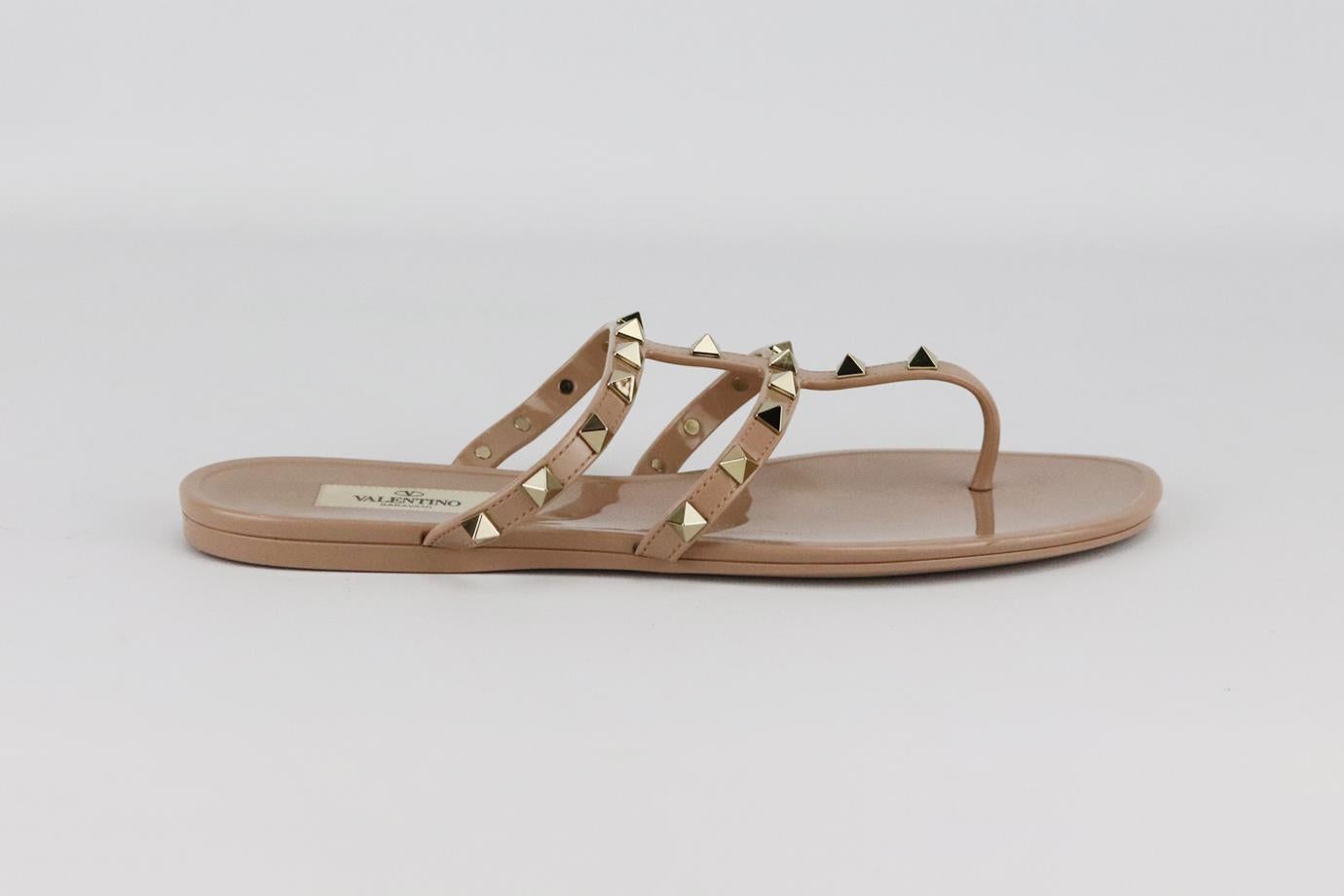 Valentino Garavani Rockstud rubber sandals. Dusty-pink. Slips on. Does not come with box or dustbag. Size: EU 39 (UK 6, US 9). Insole: 10 in. Heel: 0.5 in
