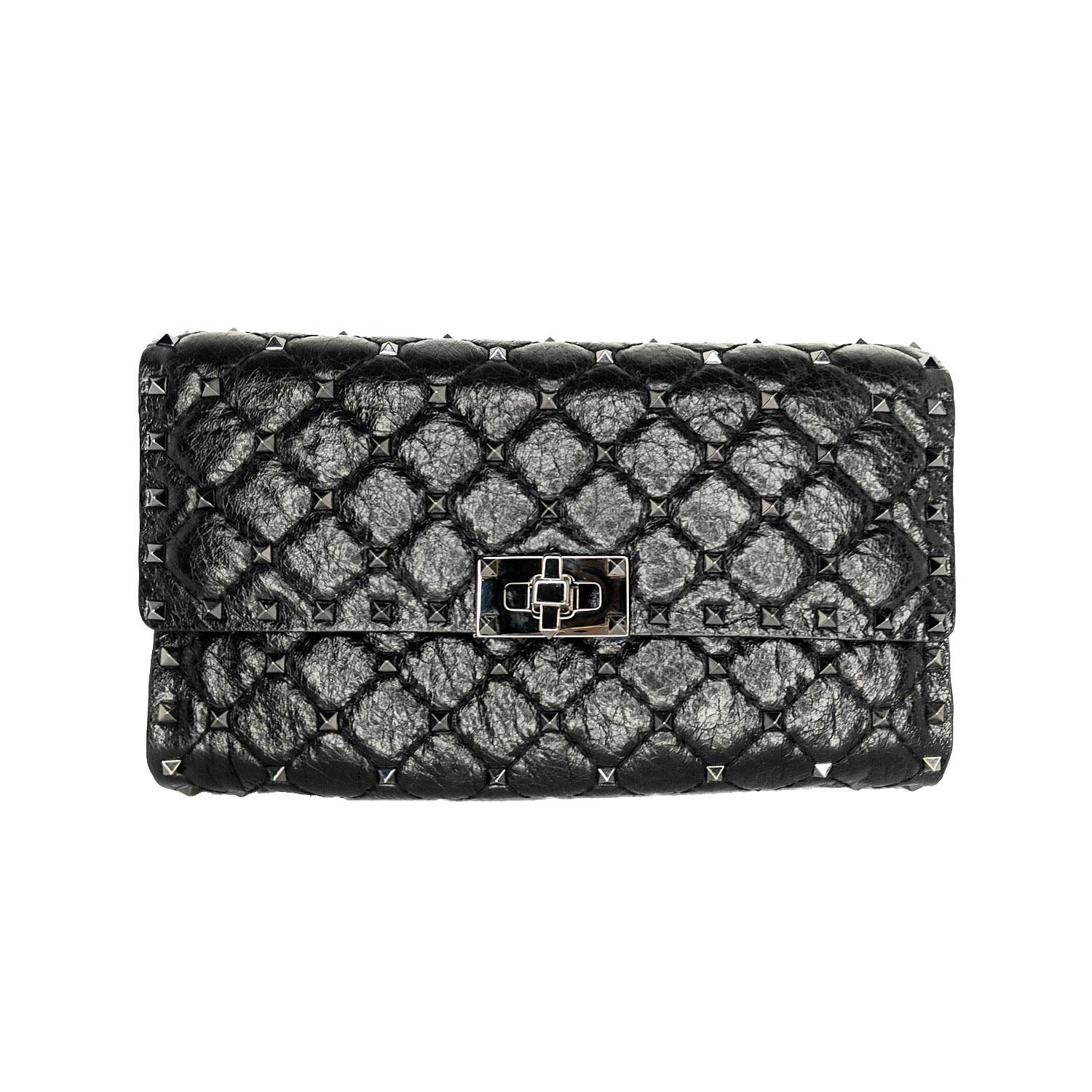 Valentino Garavani quilted, crinkled lambskin wallet-on-chain with micro signature ruthenium Rockstuds. Removable chain shoulder strap and flap top with turn-lock clasp. Interior, one zip pocket; one bill and eight card slots. Made in Italy. Retail
