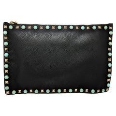 Pochette Valentino Garavani Rockstud turquoise avec détails en clous