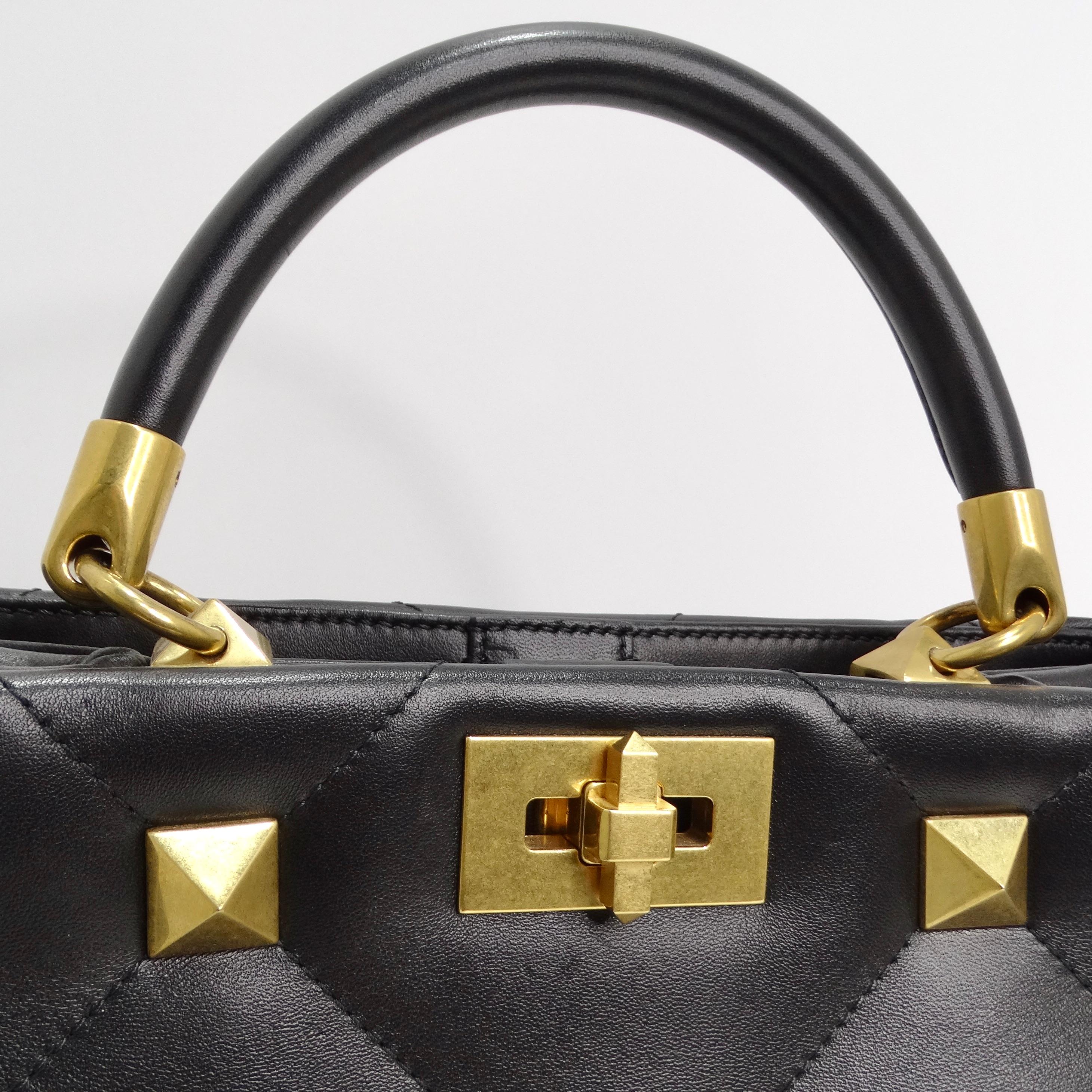 The Valentino Garavani Roman Stud Nappa Bag is a luxurious and versatile accessory that seamlessly blends sophistication with edgy detailing. Crafted from quilted black leather, the bag features an eye-catching rhombus pattern enhanced by