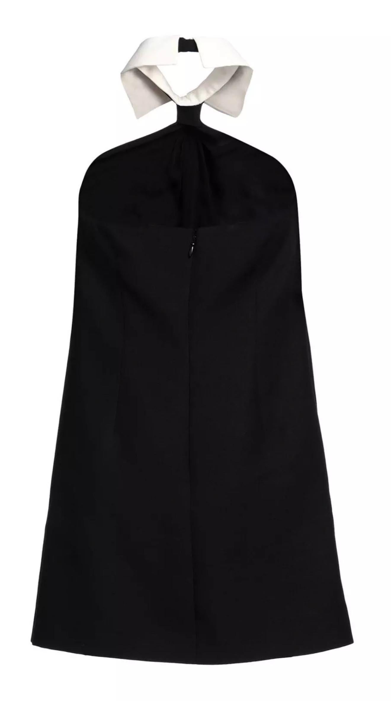 From Pierpaolo Piccioli’s 'Black Tie' collection, which reimagined formalwear through a gender-fluid lens, this striking mini dress opened the Fall 2023 runway show. Crafted in a black wool and silk blend, it features a clean, tailored silhouette