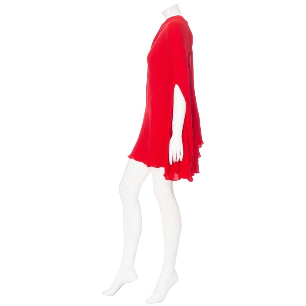 Valentino Garavani Red Silk-Georgette Cape-Effect Bodysuit Mini Dress 

Spring 2023 Ready-to-Wear
Bright Red
Pleated
Asymmetrical cape design
High round neckline
Bodysuit lining
Button fastening at neck
Mini, thigh length
Tent silhouette
Made in