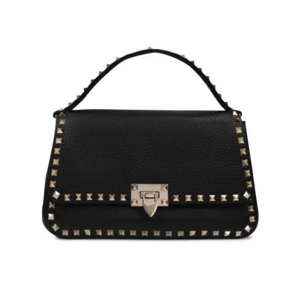 Valentino Garavani Small Rockstuds Top Haandle Bag

Material: smooth calfskin / Colour : Noir - Nero /Worn two ways - one top handle and one shoulder strap / Lining : leather / Closure : flap with turnkey clasp /

Handle drop : 40 cm - Shoulder