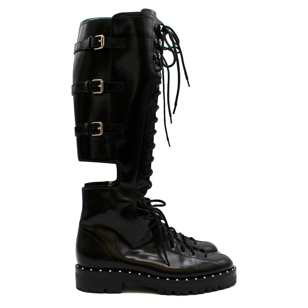 Black Valentino Garavani Soul Rockstud Military Boots

- Knee-high
- Round Toe With Tonal Lace-up Closure 
- Cut-out Vamp and Heel 
- Zip Closure At Inner Side 
- Adjustable Pin-buckle Straps  On Outer Side 
- Signature Studs 
- Treaded Rubber Sole
