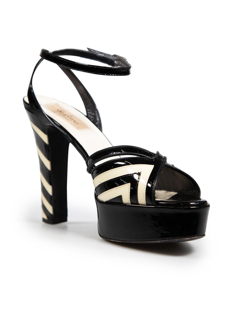 CONDITION is Very good. Minimal wear to heels is evident. The insoles have slight discolouration along toe bed areas and some glue spots in other areas. There are abrasions and marking across the heel, platform and vamp. The soles have abrasions and