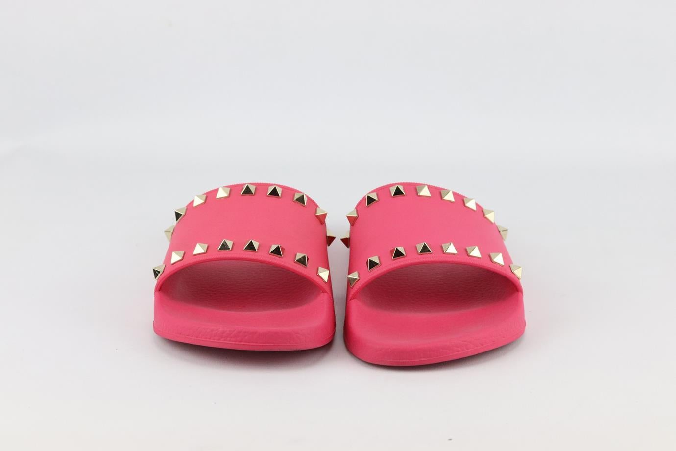 Valentino Garavani The Rockstud rubber slides. Pink. Slip on. Does not come with box or dustbag. Size: EU 39 (UK 6, US 9). Insole: 10 in. Heel: 1 in. Very good condition - Worn once. Light wear to soles; see pictures.

