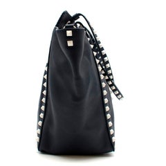 Valentino Garavani The Rockstud two-tone leather trapeze bag 13cm