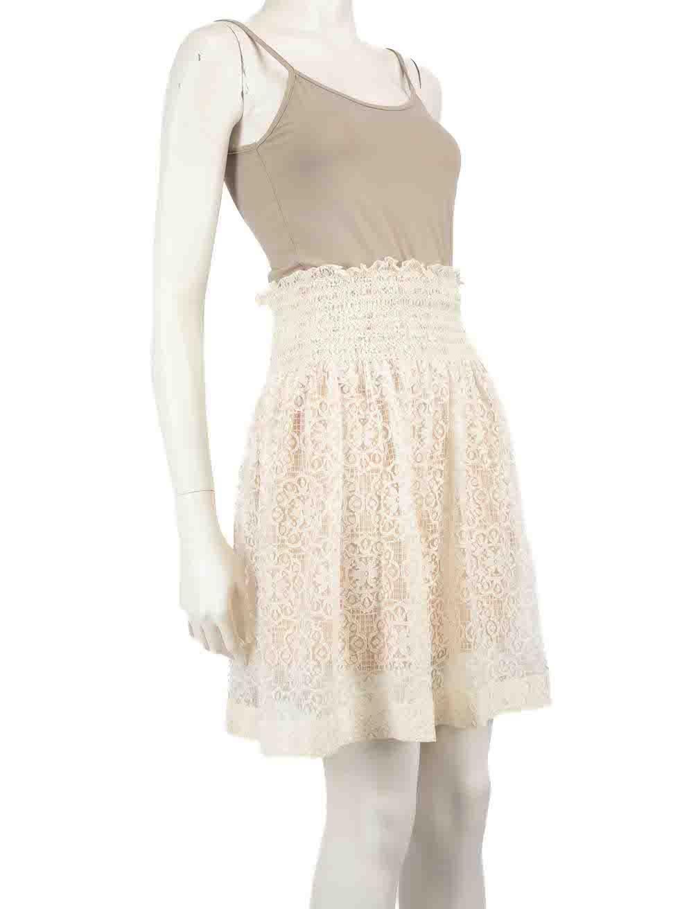CONDITION is Very good. Minimal wear to the skirt is evident. Minimal wear to the skirt is seen with discolouration marks all over especially, on the front right side and one on the upper back on this used Red Valentino designer resale item.
 
 
 
