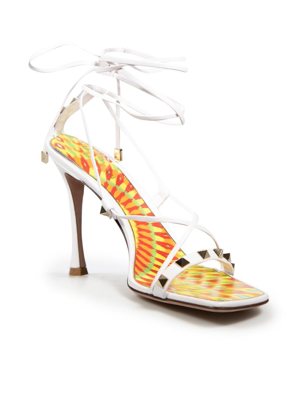 CONDITION is Very good. Minimal wear to the shoes is evident, the left shoe has an abrasion on the heel and the right shoe has an abrasion on the rear area. The hardware detail on the tips of the laces have scratches on this used Valentino Garavani