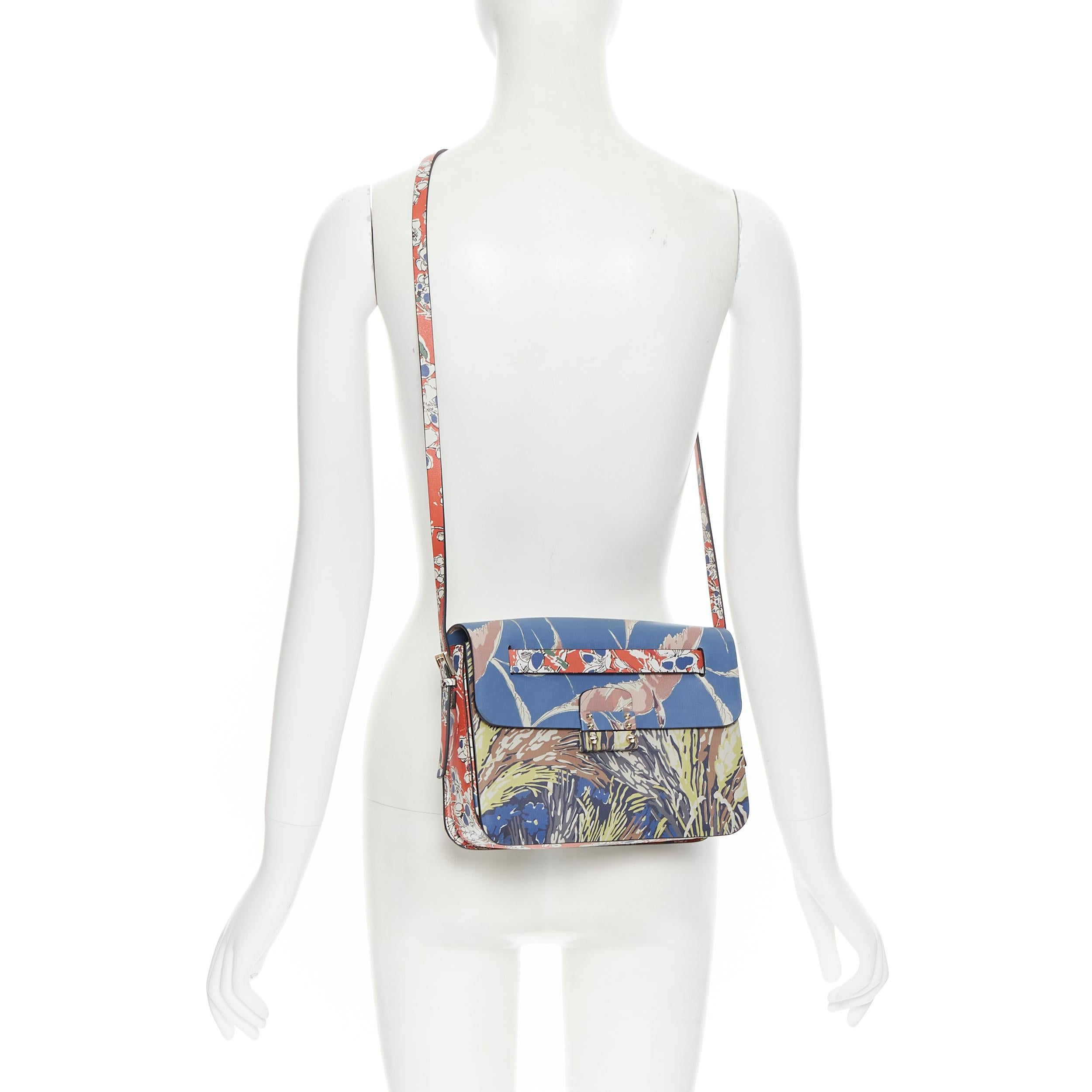 VALENTINO Garden Couture Mime floral print leather clasp flap crossbody bag Reference: TGAS/B00585 Brand: Valentino Model: Garden Couture Mime Material: Leather Color: Blue Pattern: Floral Closure: Clasp CONDITION: Condition: Excellent, this item