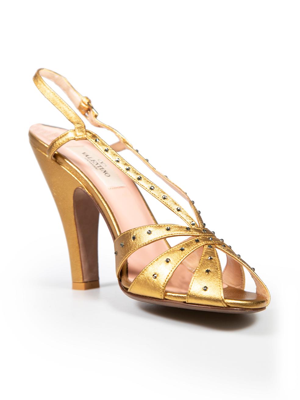 CONDITION is Very good. Minimal wear to heels is evident. Minimal wear to the outsoles where mild abrasion can be seen on this used Valentino designer resale item. Comes in original box with dust bag.
 
 
 
 Details
 
 
 Gold
 
 Leather
 
 Sandals
