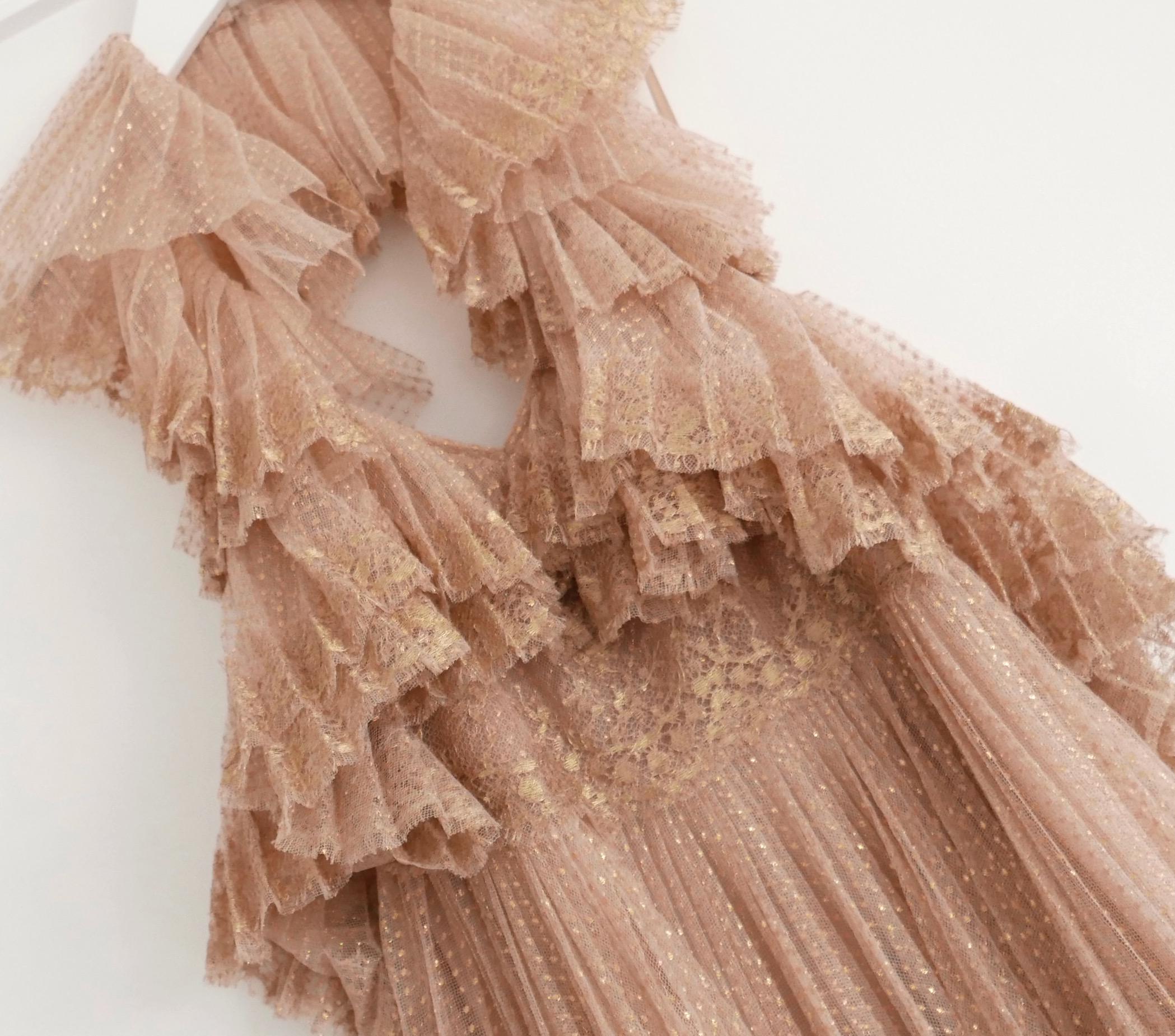 Absolute fairytale Valentino tiered tulle and  lace gown - bought for £6500 and unworn.  Made from gold speckled nude polyamide mix tulle and gold lace. It has a super feminine tiered construction with ruffled halter neck and low back. Has sparkling