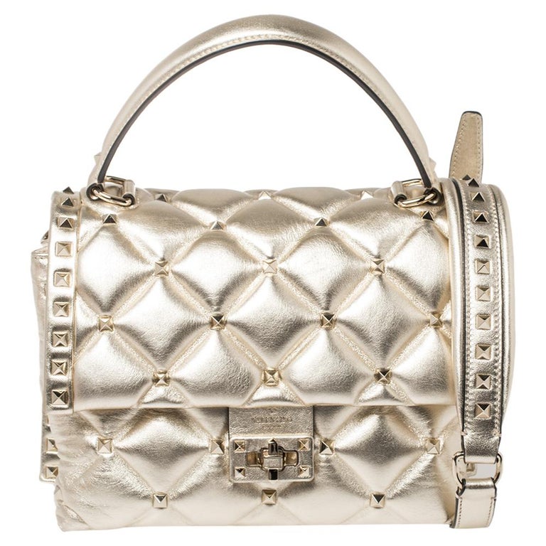 Valentino Gold Quilted Leather Medium Candystud Top Handle Bag For Sale at  1stDibs | valentino candystud top handle bag, valentino gold bag, candy  valentino age