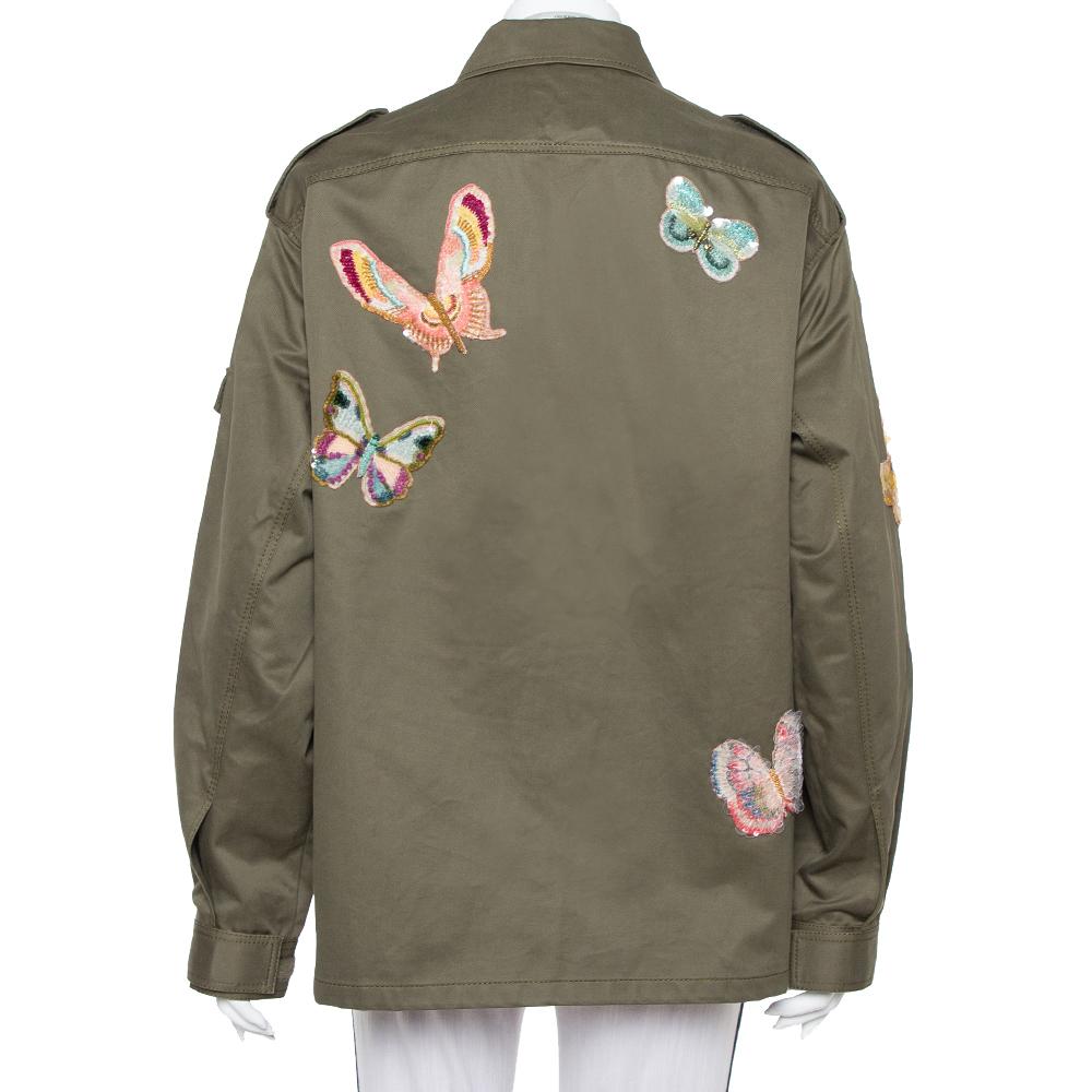 Fashioned in contemporary influence, this jacket from Valentino is definitely a necessity. Made from cotton in a green shade, it features butterfly applique and cargo pocket detailing all over. Style them with leather boots for a chic look.

