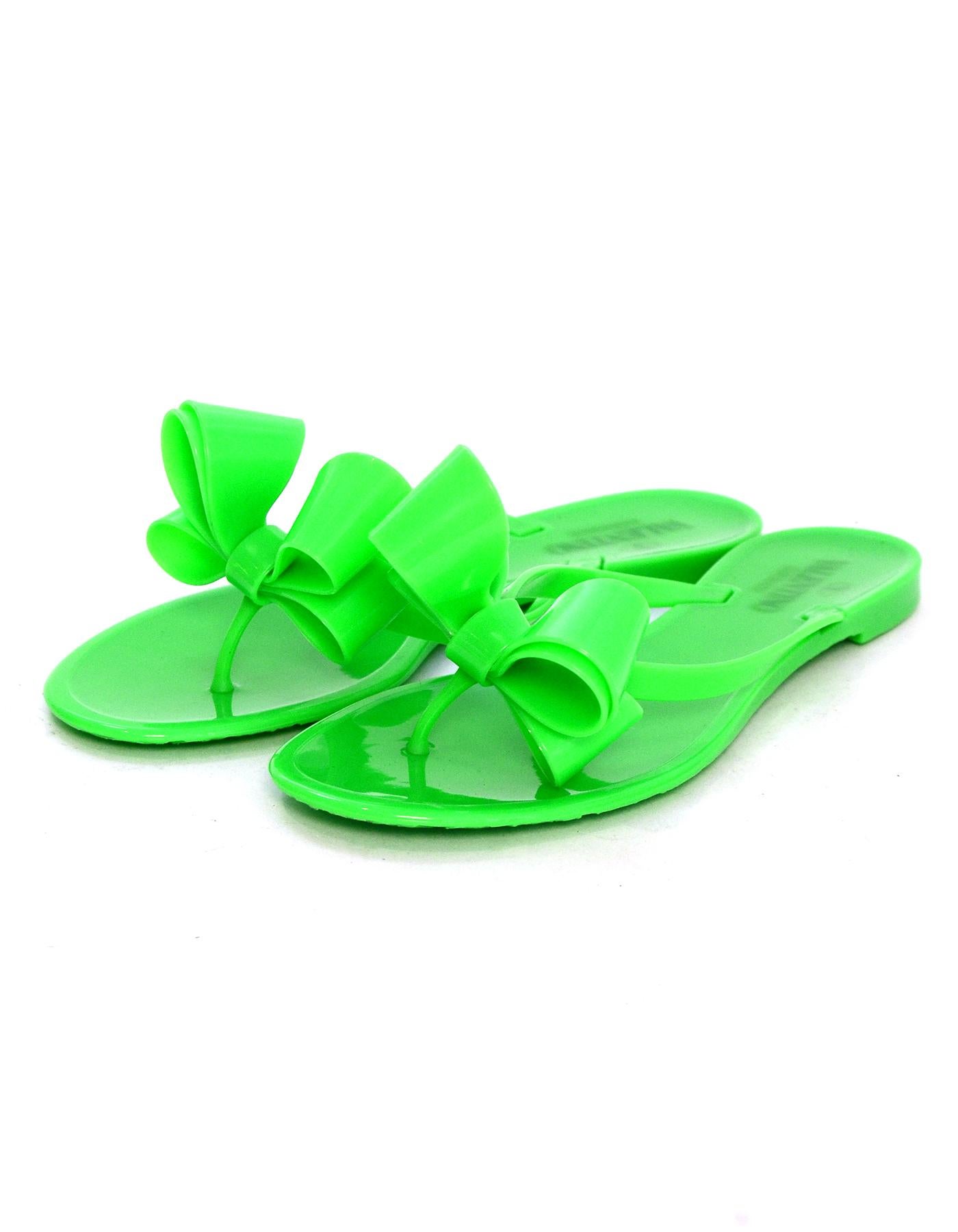 Valentino Green Rubber Jelly Couture Bow Thong Sandals sz 39 rt $295

Made In: Italy
Color: Green 
Materials: Rubber
Closure/Opening: Slide on
Overall Condition: Excellent pre-owned condition, with the exception of minor wear to soles
Estimated