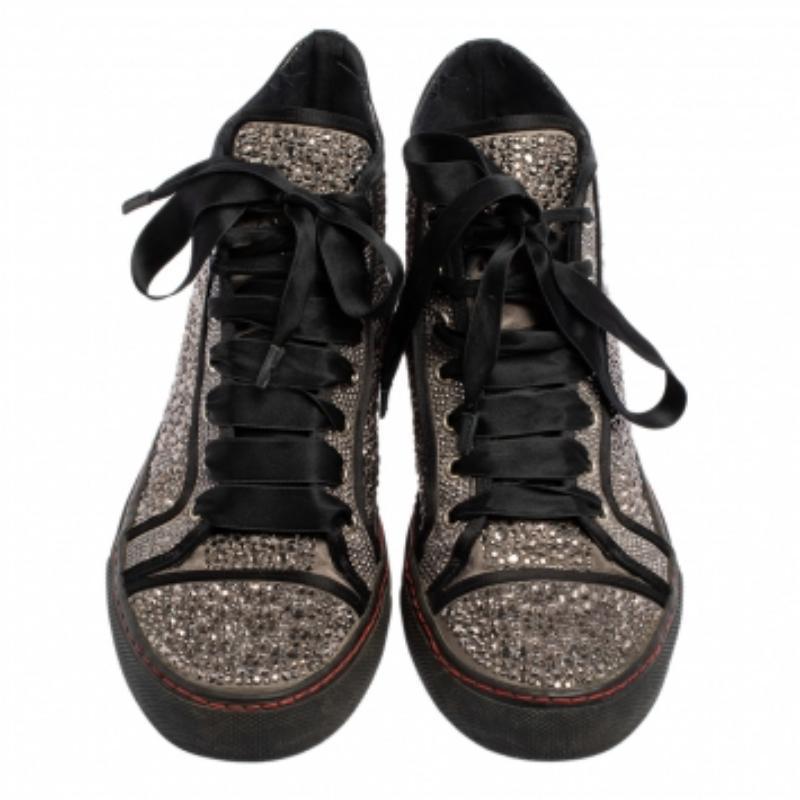 Bring home the luxurious high-fashion touch with these sneakers from Valentino. Crafted from satin, these high-top sneakers come with dazzling crystal embellishments and simple laces. You wouldn't want to miss out on such a cool pair.